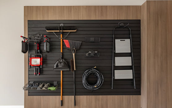black HandiWALL storage slatwall in organized garage