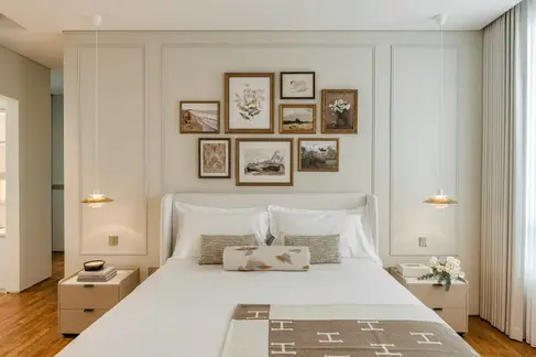 Modern bedroom with integrated storage and refined detailing.
