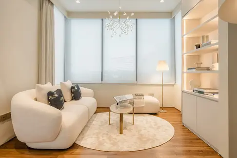Cozy retreat with armchairs and contemporary interior styling.