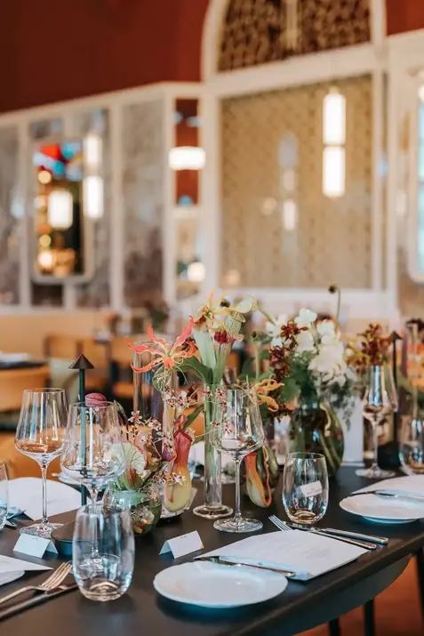 Elegant wedding table setting with floral centerpieces