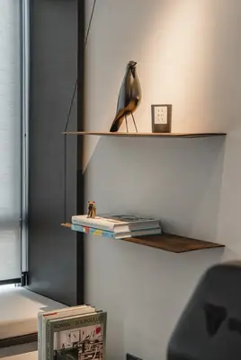 Home office with built-in shelving and custom storage solutions.