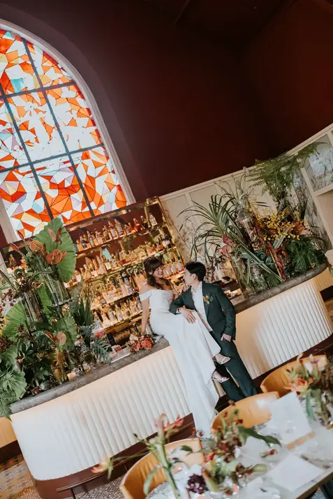 Bride Claudine and groom at their wedding bar venue