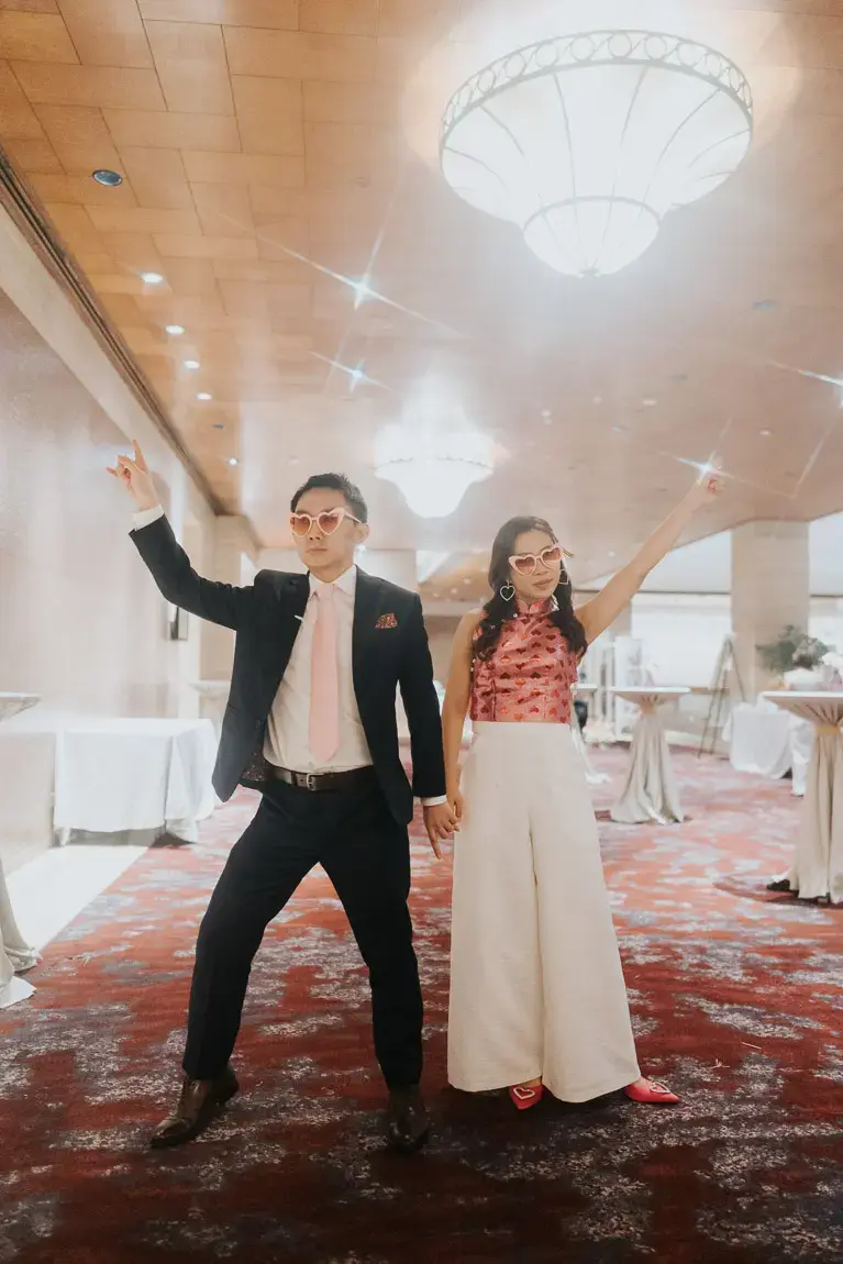 Bride and groom enjoying dancing candid moments throughout their wedding day at Sheraton Towers Singapore