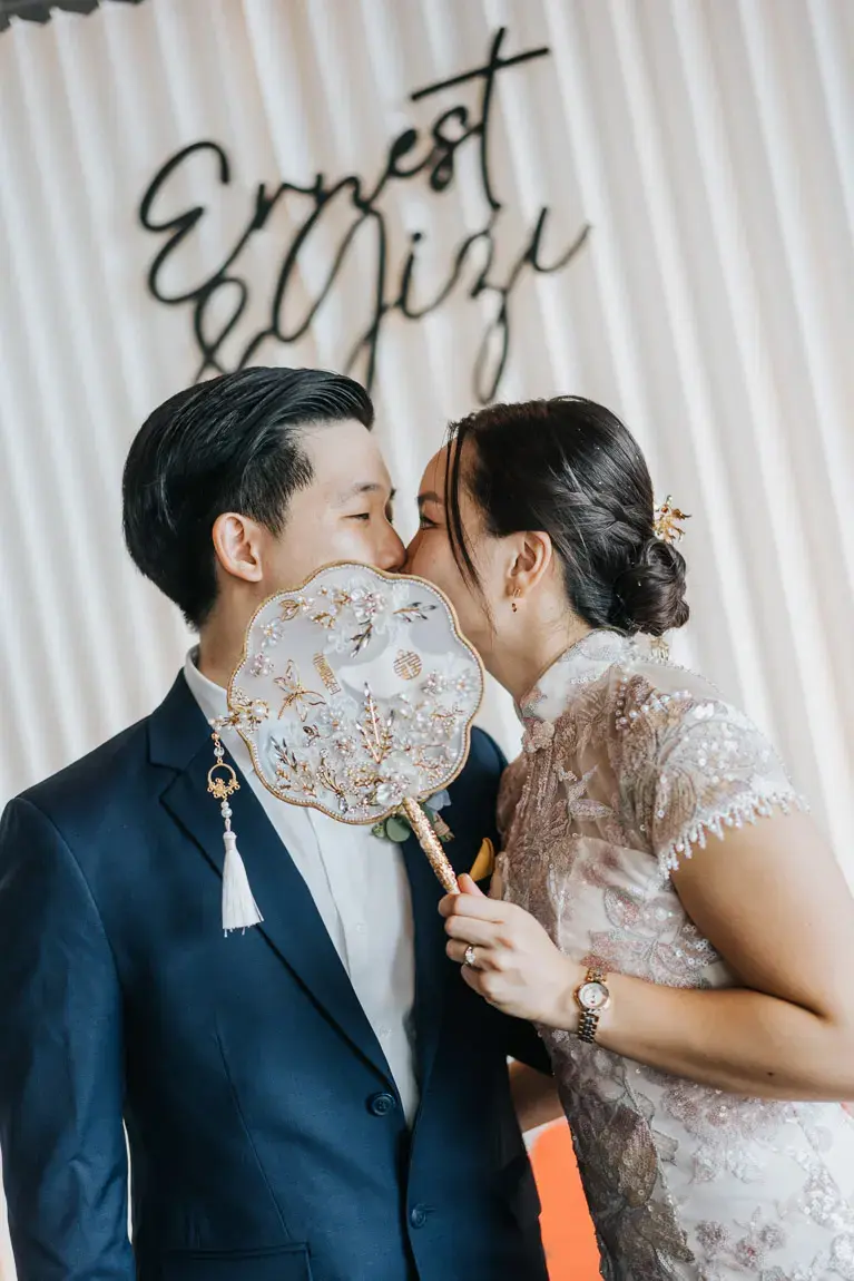chinese oriental couple portraits at reception floral decoration of 1-arden wedding photography videography singapore
