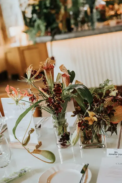 Tropical floral centerpieces on a wedding table