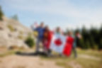 Family and Canadian flag