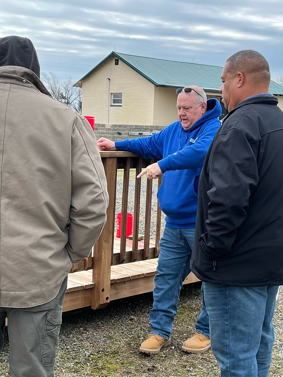 The "Wizard of Wood" teaches a wood restoration class.