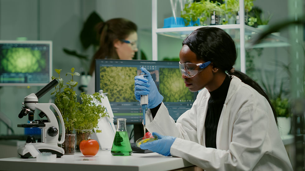 biologist-scientist-african-woman-researcher-taking-genetic-solution-from-test-tube.jpg