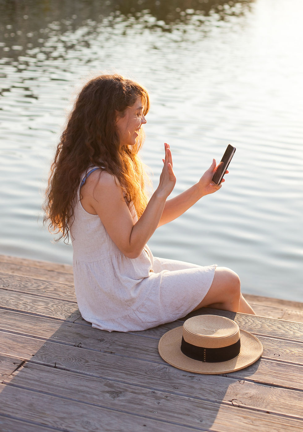 Phone woman at lake.jpg