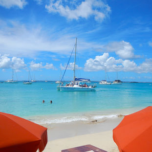Not so touristy after all: graceful Grand Case beach, St. Martin
