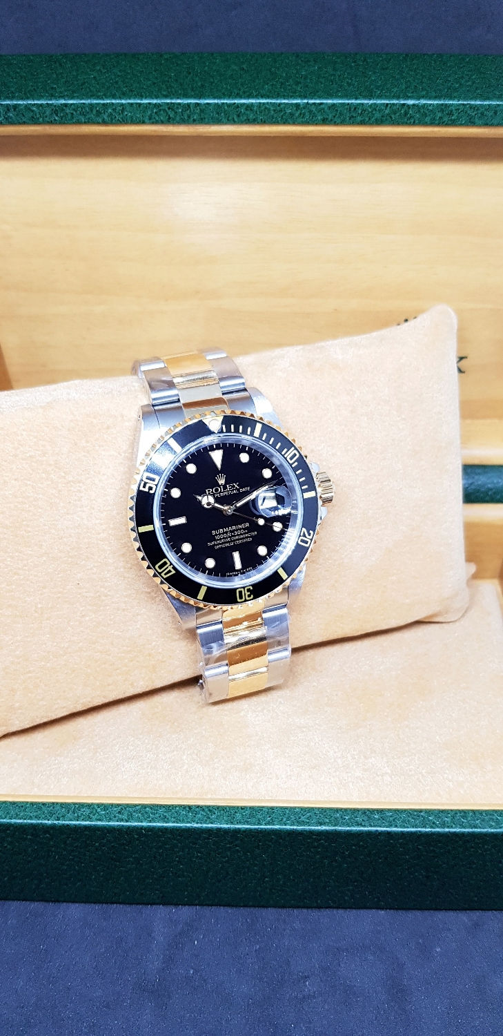 Thumbnail: Rolex Oyster Perpetual 18K Half Gold Black Submariner Date REF: 16613