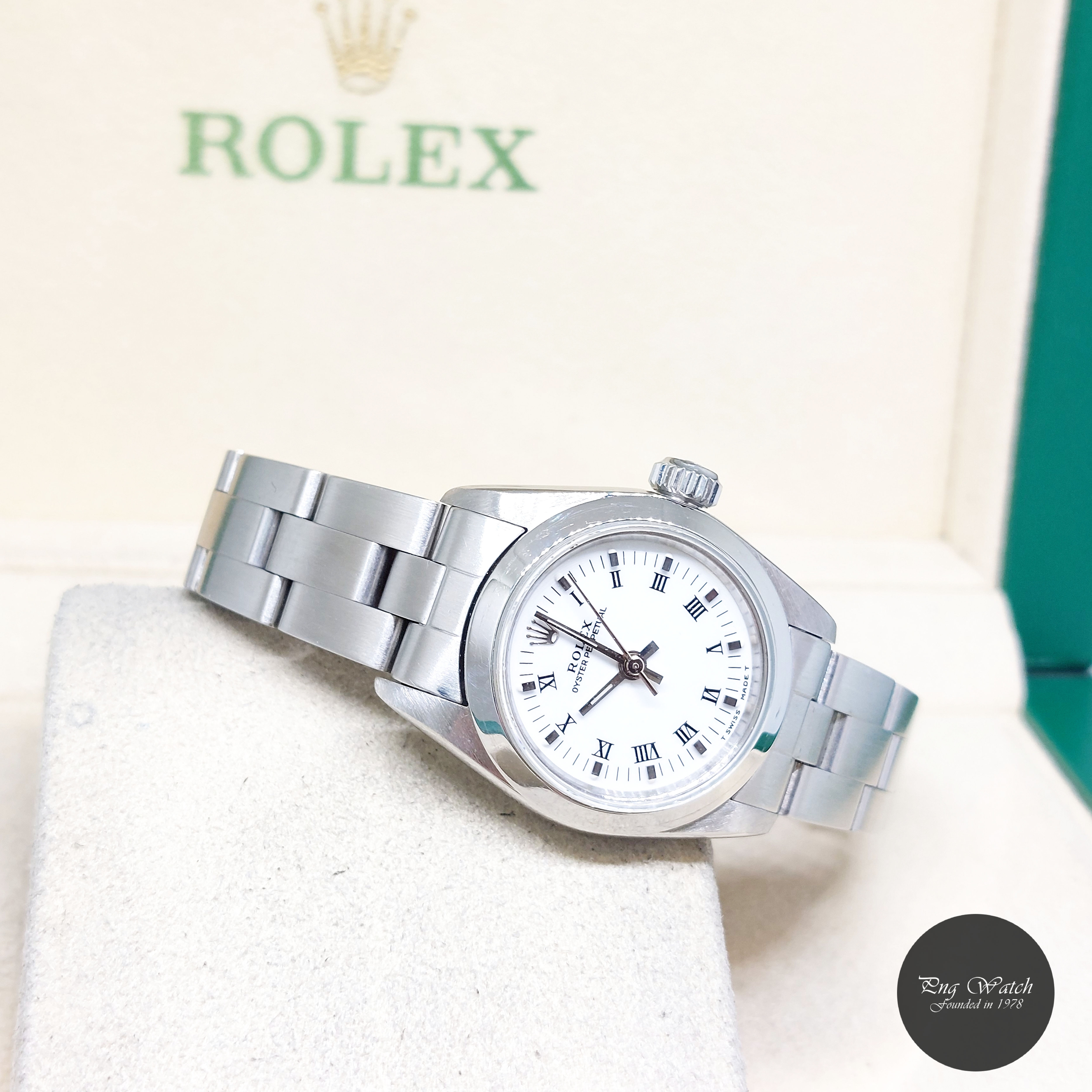 Rolex 24mm White Roman Dial Oyster Perpetual REF: 67180 (U3 Series)