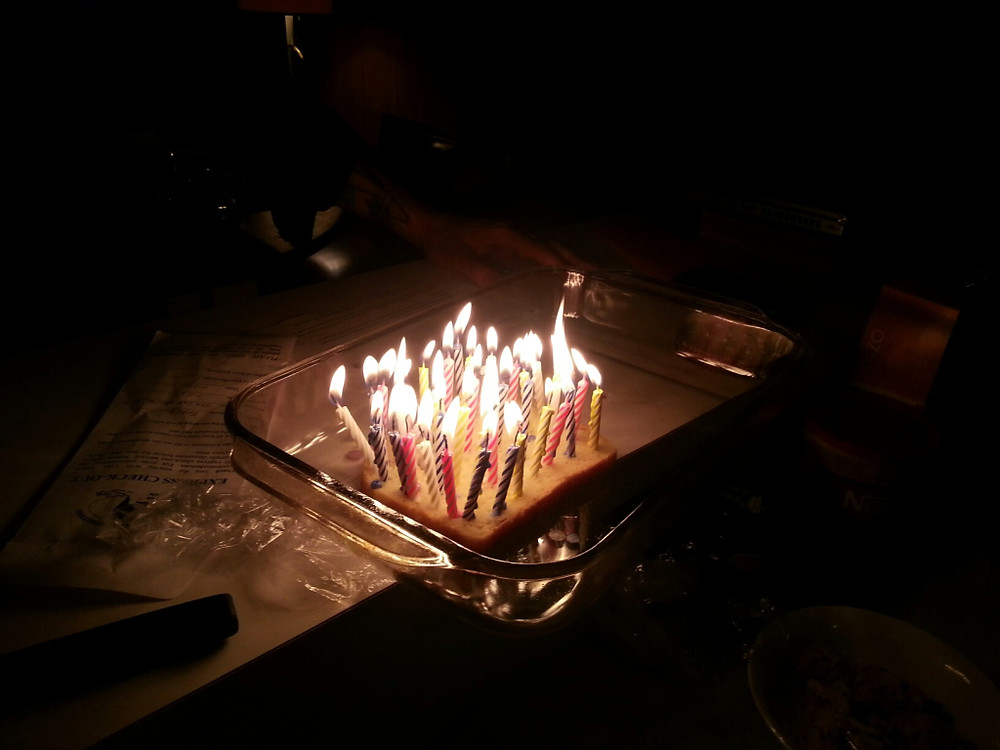 Pretty awesome seeing my friends, my sweetheart, and my brother & sister-in-law all grinning as my candles were brought to me to blow out. If you chose DF ice cream for your b-day, how do you get 40 candles involved? Simple! Bread!