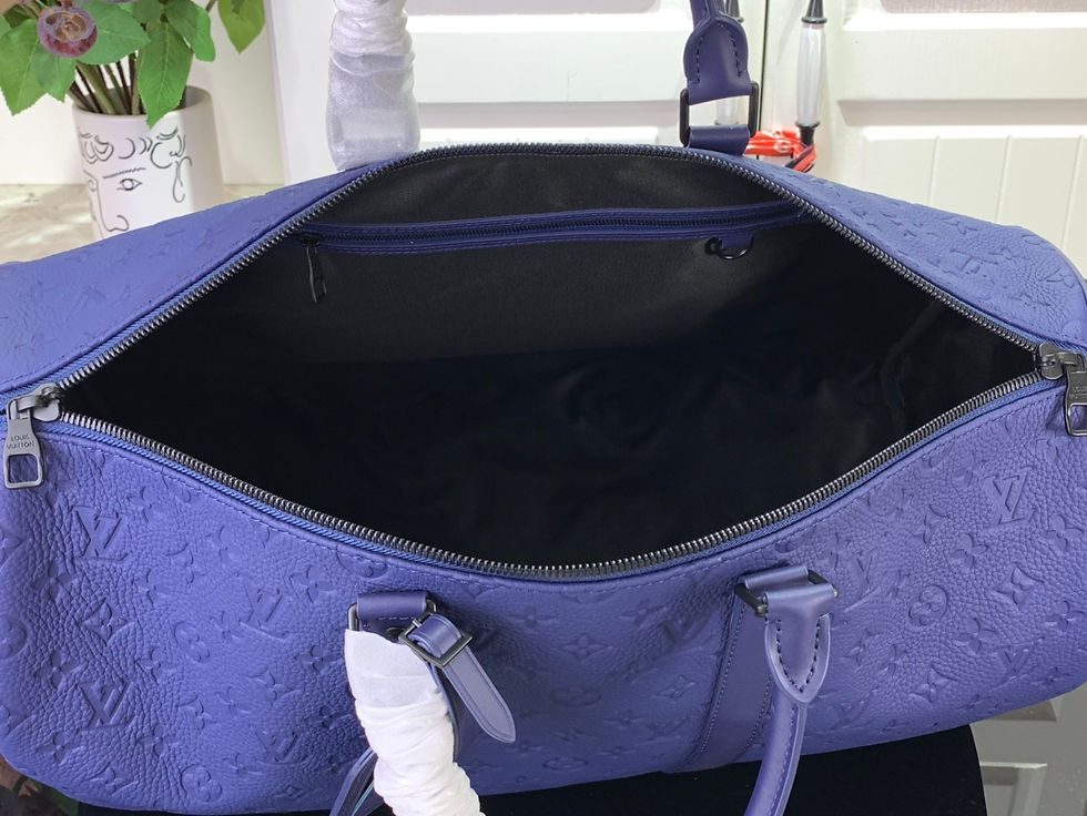 Thumbnail: Louie Vuitton Duffle Bag