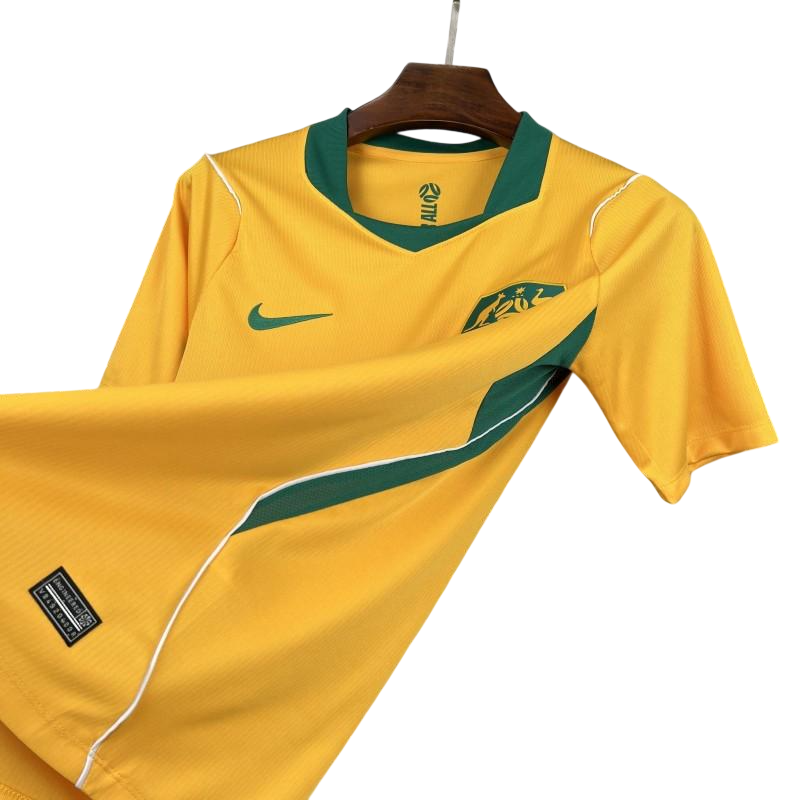 Miniatura: Camisa da Austrália 2026/27 I Modelo Torcedor Amarela