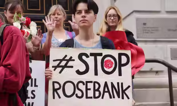 Protestors stand outside the Department for Energy Security and Net Zero after it was revealed that oil from the controversial Rosebank field will be sold on the international market. Image: Lucy North/PA