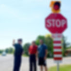 Police officer with 24-Hour Flashing Beacon