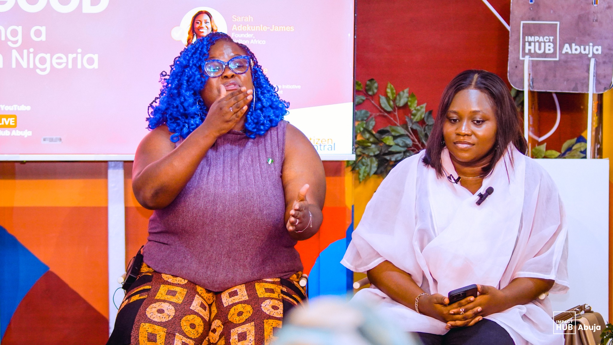 Rita and another participant during a creative workshop