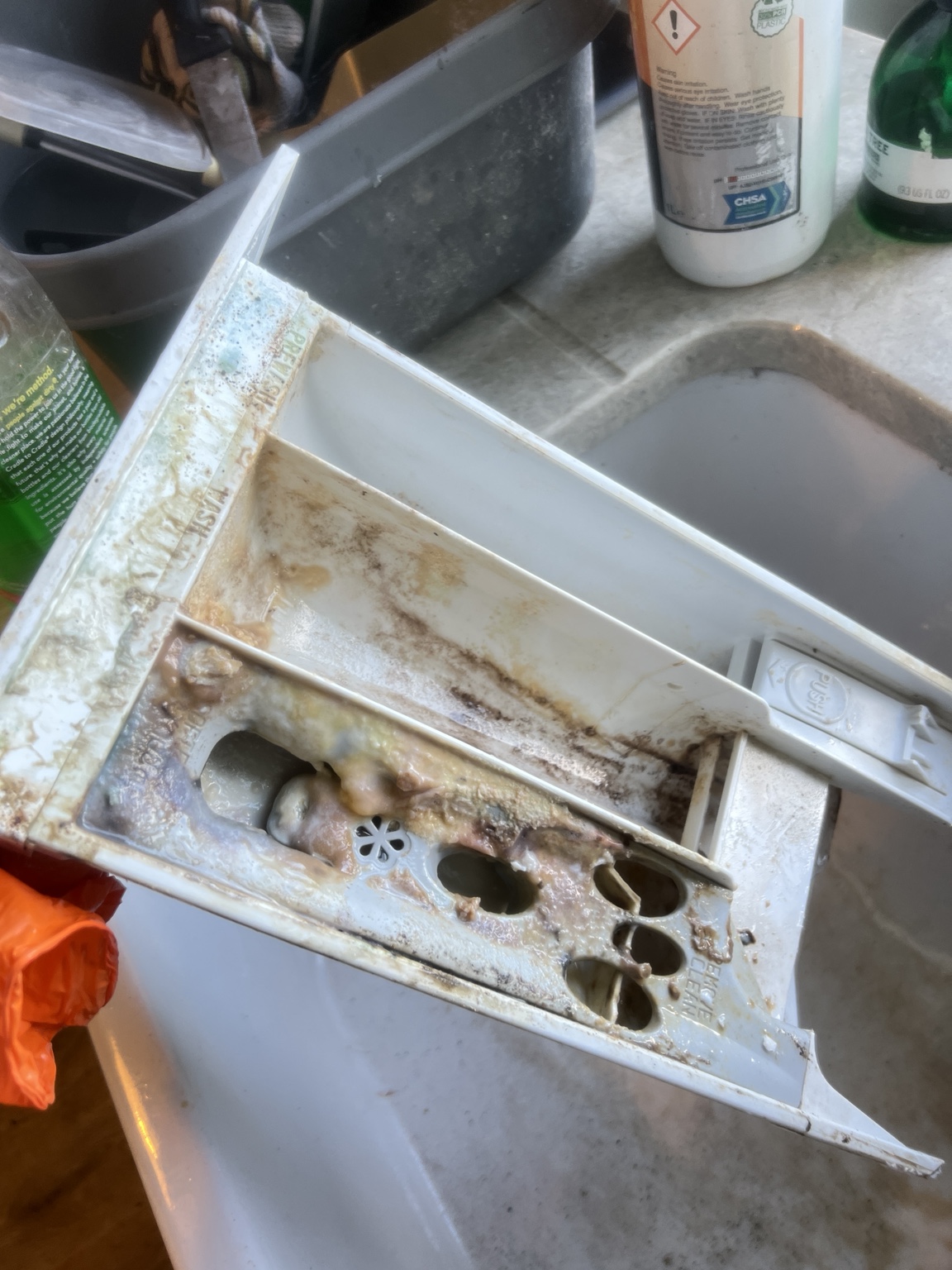 Before cleaning: Washing machine drawer