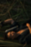 Image of the Tan Samurai Laying in the grass