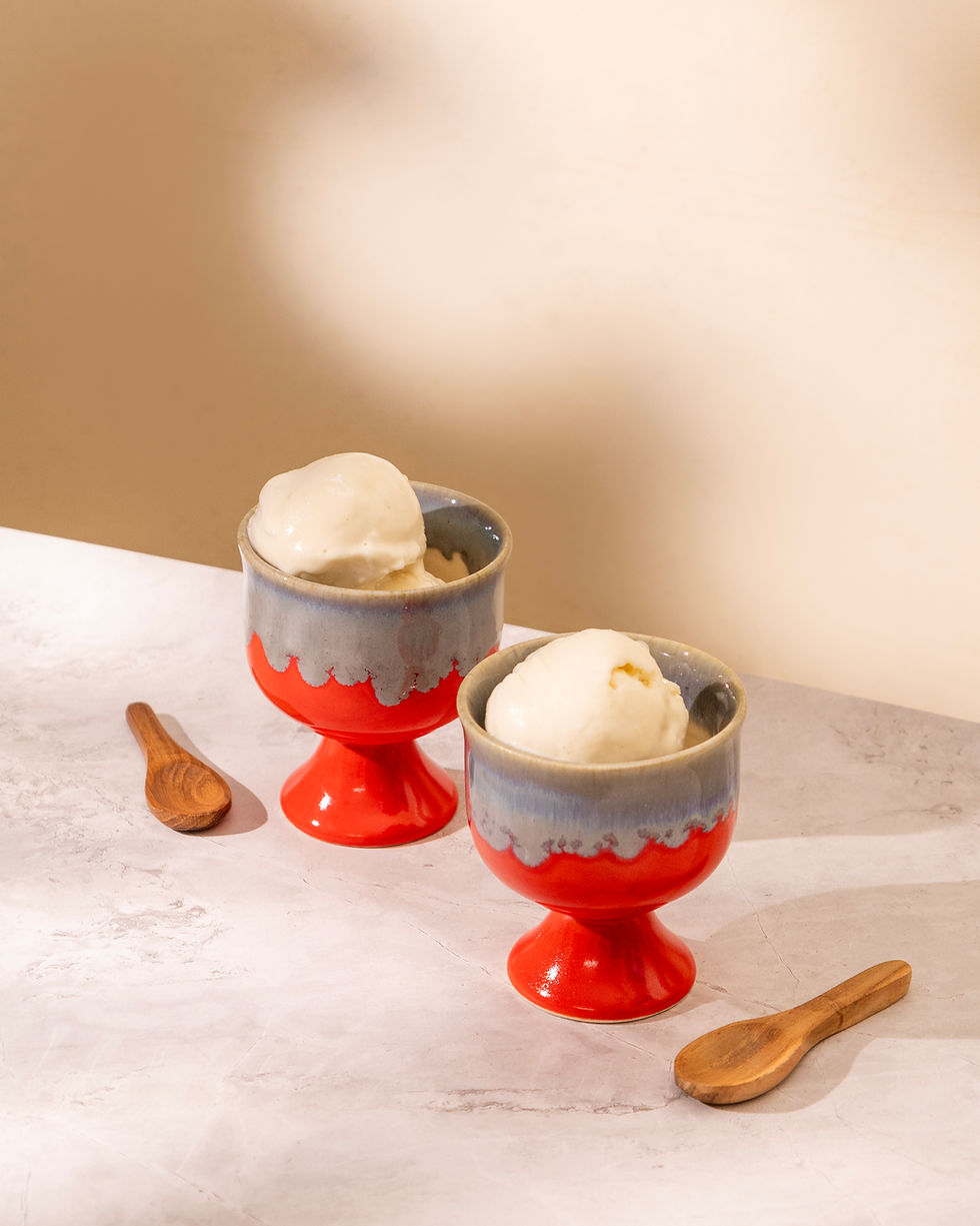 Set of high-gloss glazed ceramic sundae dessert cups in a modern, rounded silhouette.