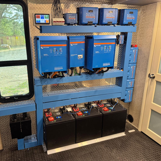 Big Beard Battery, Victron inverter, 24 lithium batteries, lynx, cerbo, autotransformer in Luxe toy hauler