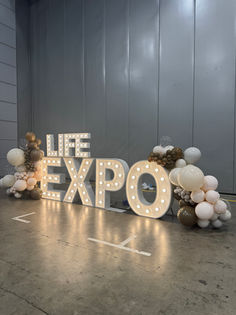 LIFE EXPO convention centre mixed size light up letters stacked