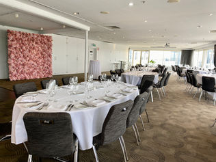 Take a blank canvas event space and turn it into something beautiful with our pink flower walls for Mother's Day events