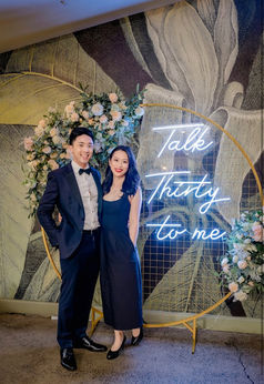 Gold circular mesh stand with Talk Thirty to me neon sign at Paw Paw Brisbane