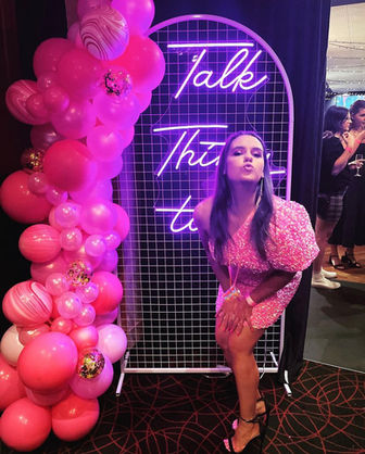 Talk Thirty to me neon sign with mesh arch backdrop for 30th birthday party