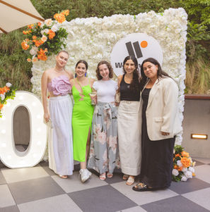 White flower wall with orange faux florals and '10' giant LED numbers at Fiume Rooftop Bar, Crystalbrook Vincent Brisbane