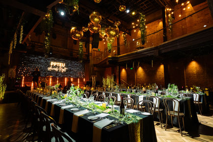 Gold orb sets 2x hanging from the ceiling at The Warehouse Brisbane