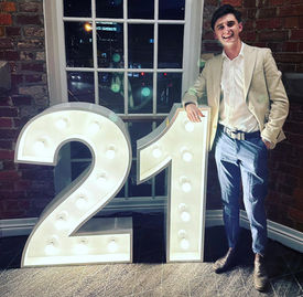 21 light up numbers for a guy's birthday party at The Lord Alfred Brisbane venue