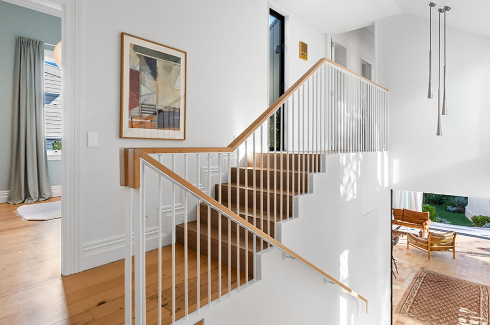Shift House recycled Kauri staircase