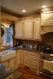 Antique white glazed kitchen cabinets handcrafted by J D Woodworking. Highland Park, Illinois