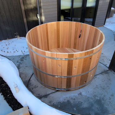 Crafted from clear red western red cedar hot tub by J D Woodworking