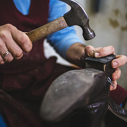 cobbler images repairing shoe heel