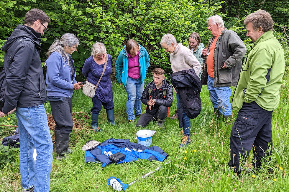 Volunteers testing water quality at Bont Dolgadfan - image taken by Fiona