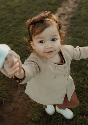 baby looks at camera during a portland family photography session