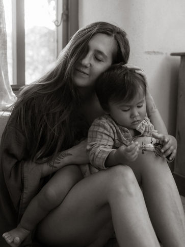 portland motherhood photographer captures mama snuggling her baby boy