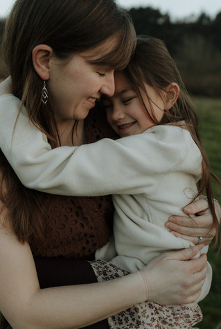 daughter hugs mom