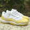 Thumbnail: Air Jordan 11 - Low "Yellow Snakeskin"