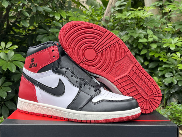 Air Jordan 1 - High "Black Toe Reimagined"