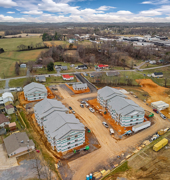 Aerial view of a multi-family residential development with grading, utility installation, and sitework in progress for Siteworks Solutions