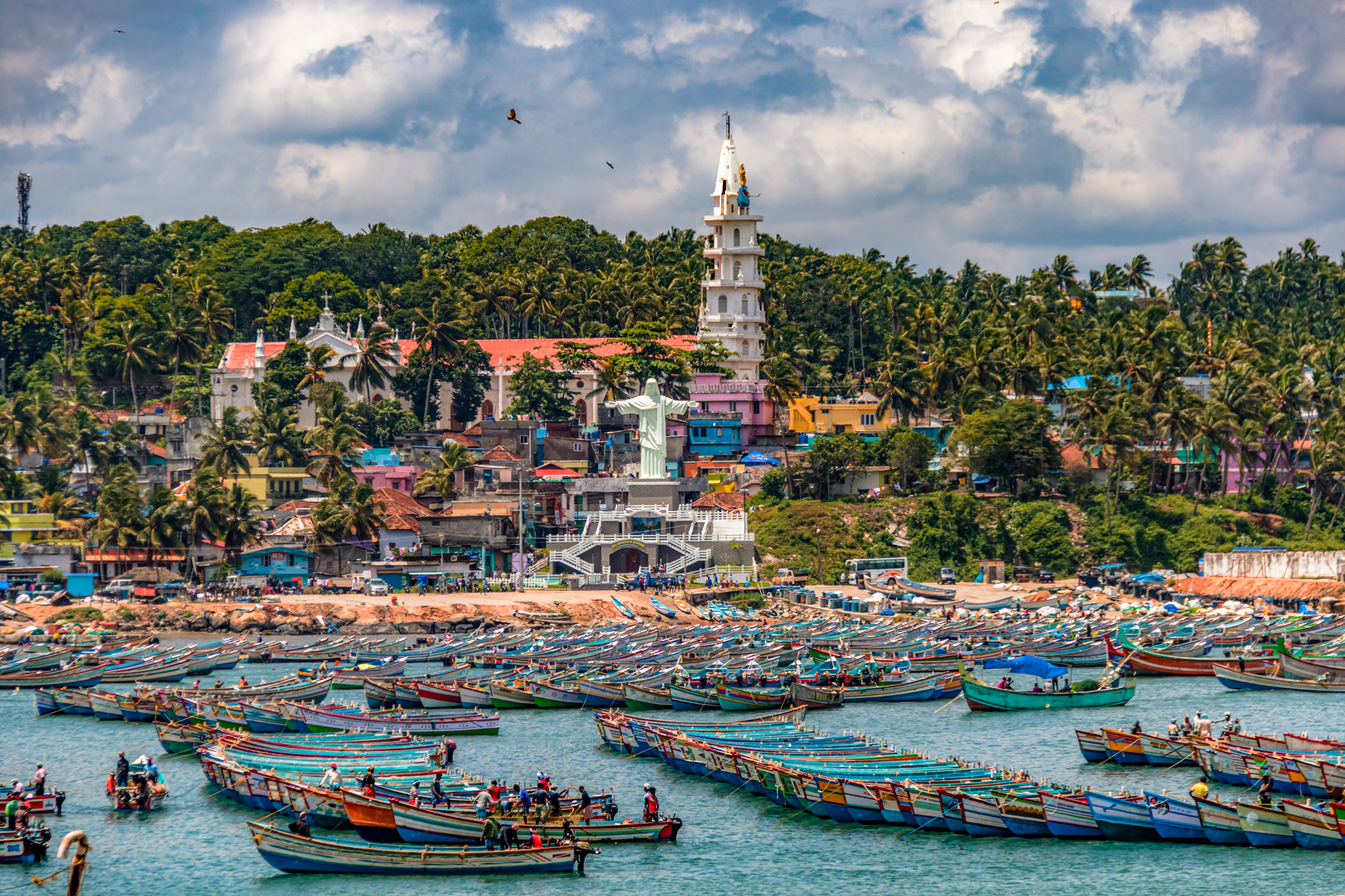 Fishing boats and a church in a coastal town