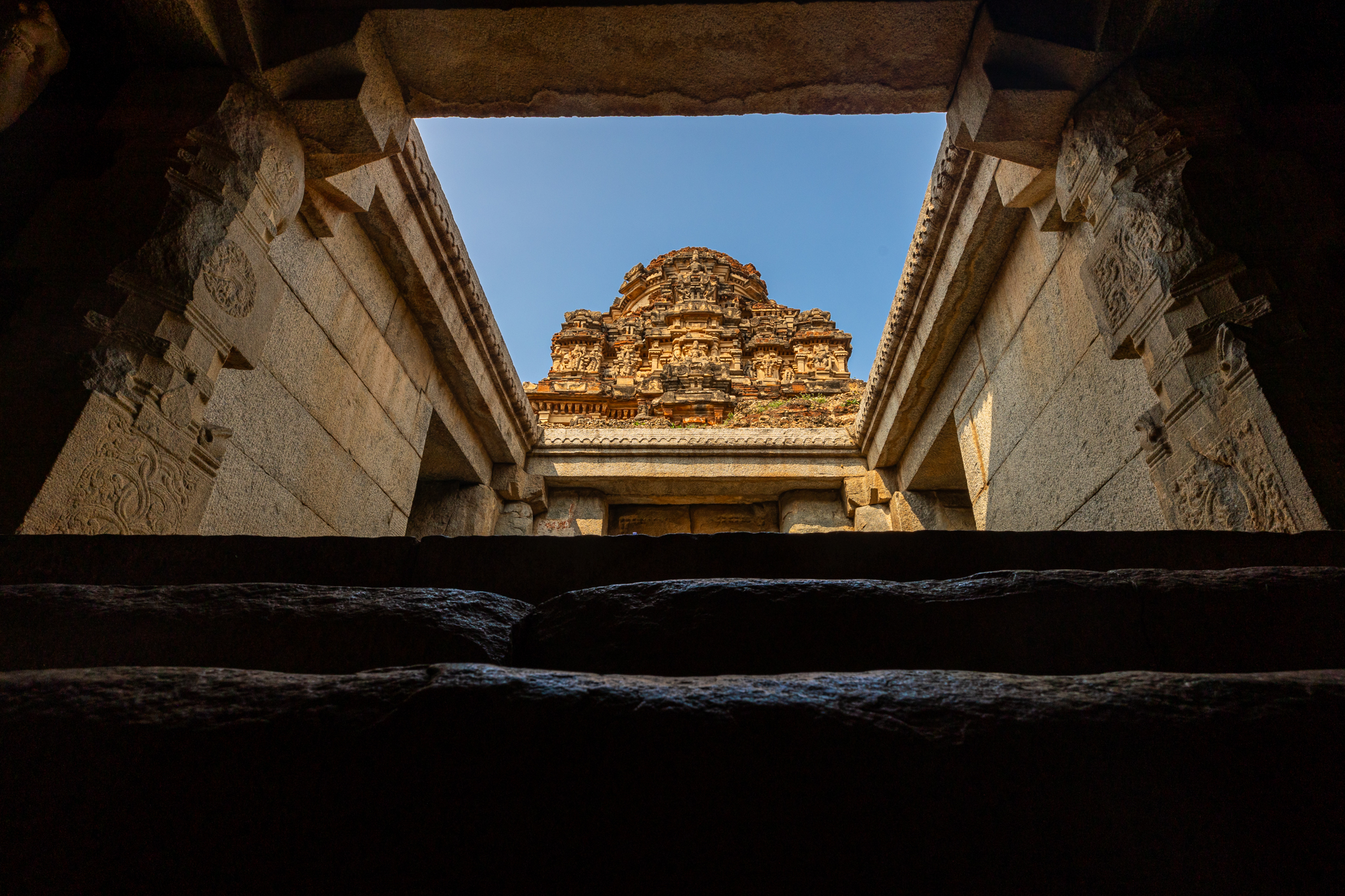 Ancient temple architecture viewed from stone steps