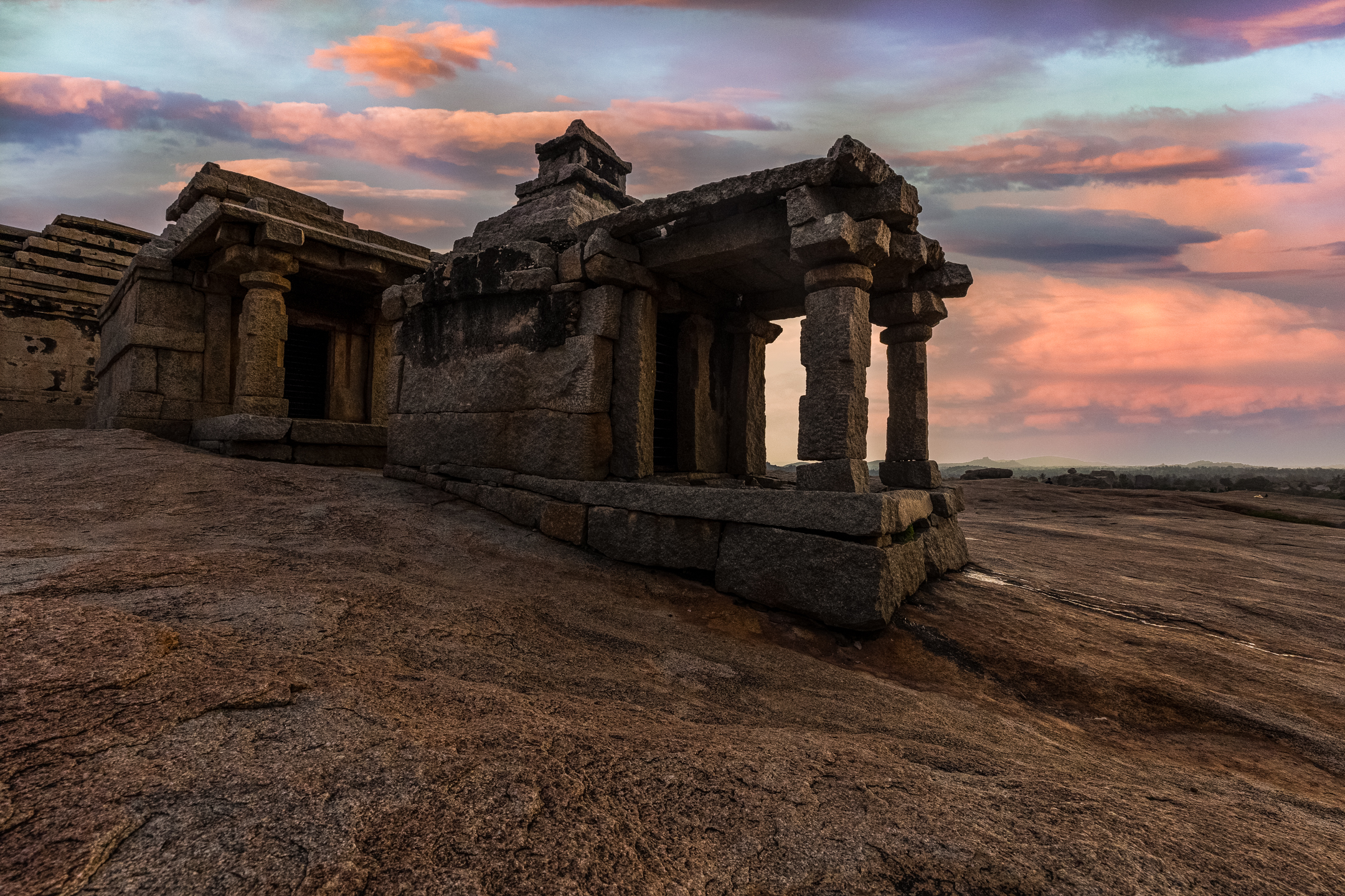 Hampi temple against a sunset sky