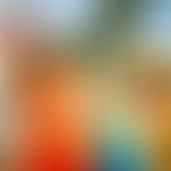 Spring Break all-inclusive resort drinks lined up along the beach with the sunset in the background.