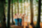 Happy family together in the woods on a beautiful day, during golden hour. Pine trees, bliss, joy. Wallflower Photography