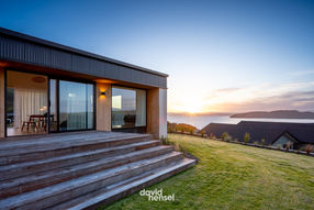 High performance home in Taupo New Zealand on hillside with mountain views and energy efficient design